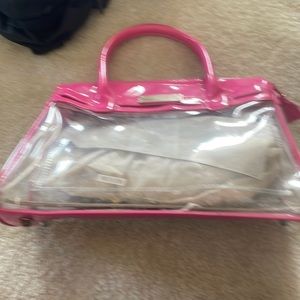 Clear tote with pink handle gently used no longer need it for work